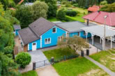 Straßenfront - Mit Einbauküche, Carport, überdachter Terrasse u.v.m.: Modularer Bungalow in Altlandsberg Bruchmühle