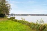 Werlsee - Direkt am Werlsee! Fußbodenheizung, Rollladen, Panoramafenster, Bootsanleger: Wohnung in Grünheide