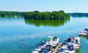 Blick vom Bootssteg - Direkt am Werlsee! Fußbodenheizung, Rollladen, Panoramafenster, Bootsanleger: Wohnung in Grünheide