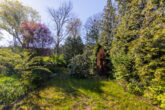 Idyllischer Garten - Mit Keller, Einbauküche, Doppelcarport u.v.m.: Naturverbundenes Reihenmittelhaus nahe Strausberg