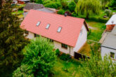 Mit viel Wohnraum - Dreiseitenhof mit drei Wohneinheiten in Neutrebbin: Inkl. Nebengelassen, großem Hof, Garagen u.v.m.