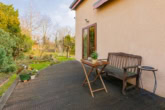 Terrasse - Mit Keller, Einbauküche, Kamin, Carport u.v.m.: Umfassend saniertes Einfamilienhaus in Blankenburg