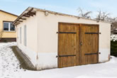 Garage - Mit Keller, Einbauküche, Garage, moderner Heizung, überdachter Terrasse u.v.m.: Bungalow in Rehfelde